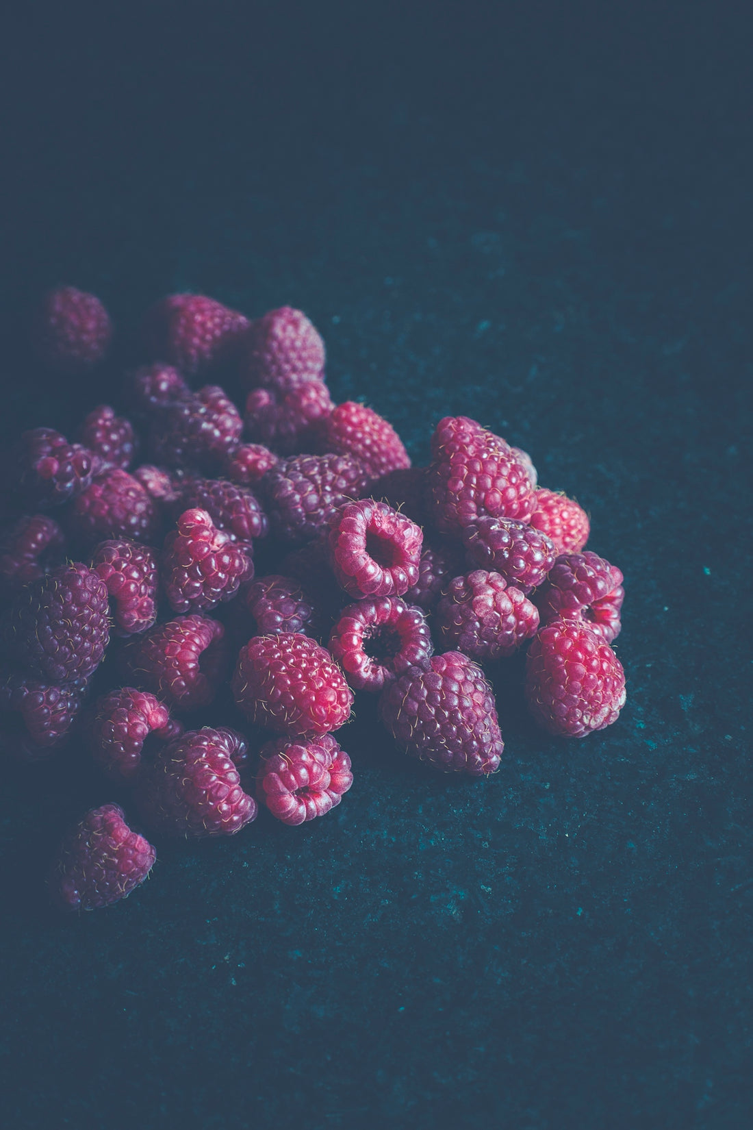 red raspberries on table